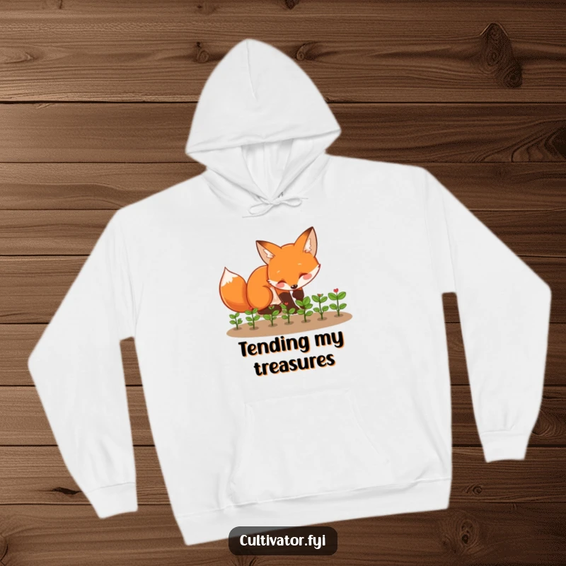Funny fox hoodie showing a playful fox tending to tiny seedlings with enthusiasm, a cozy funny gift.