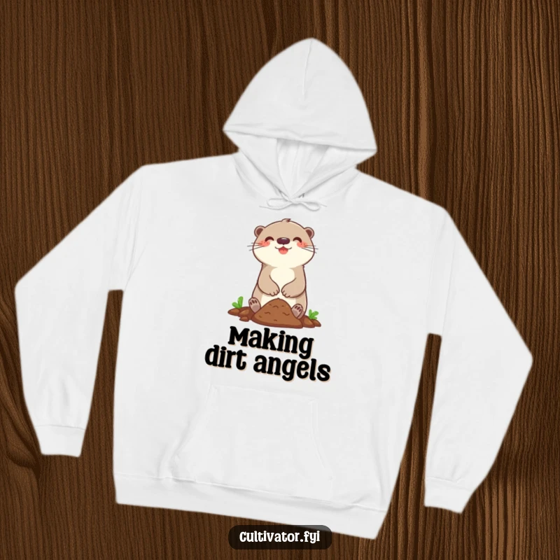 Funny hoodie with a happy otter character joyfully digging in a small patch of soil, perfect for cozy wear.