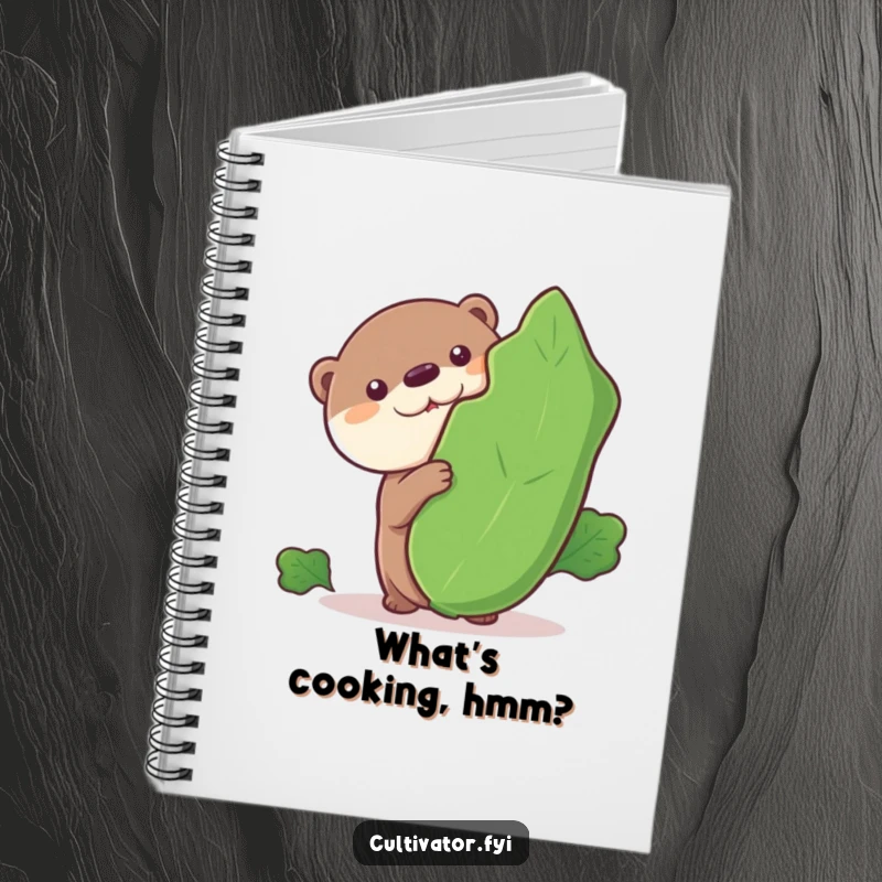 Funny notebook, curious otter peeking from a leafy vegetable, journal for notes, humorous stationery, creative inspiration.